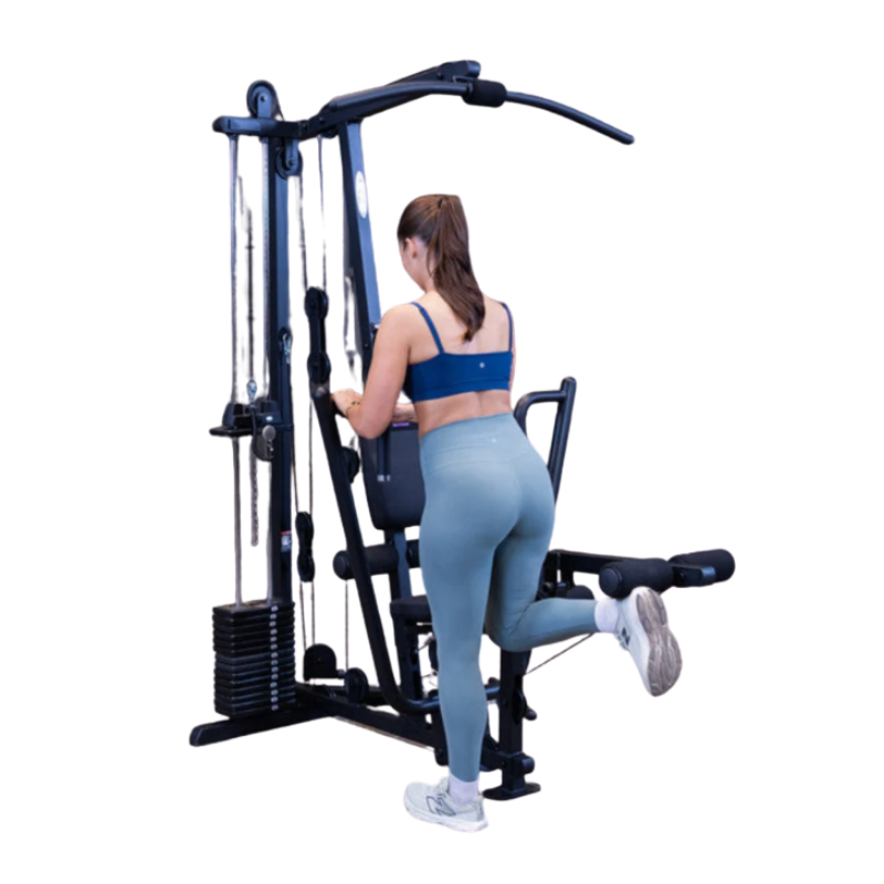 Woman performing kickbacks on Home Multigym Body-Soild G1B