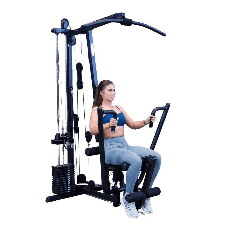 Woman using G1B BodySolid Multigym