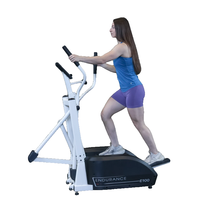 Woman using body solid e100 endurance elliptical
