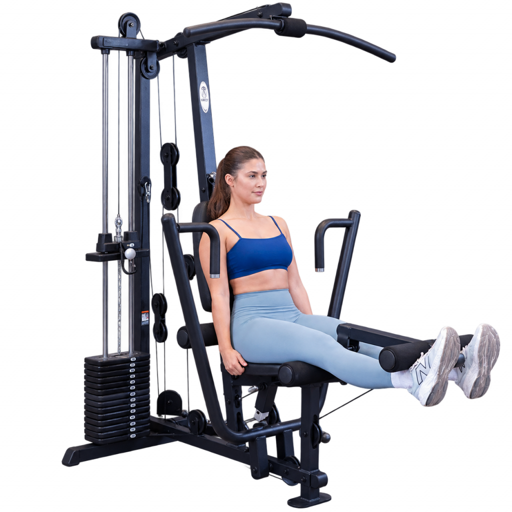 Woman using Body-Solid G1B home gym machine